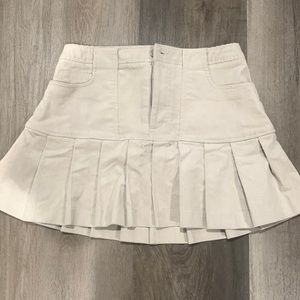 Never worn before and in very good condition. The color is tan